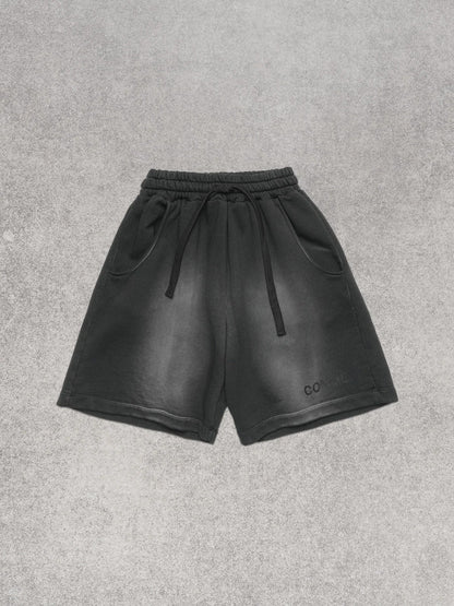 COMME DES FUCKDOWN - Bermuda in felpa stone washed con stampa sul davanti