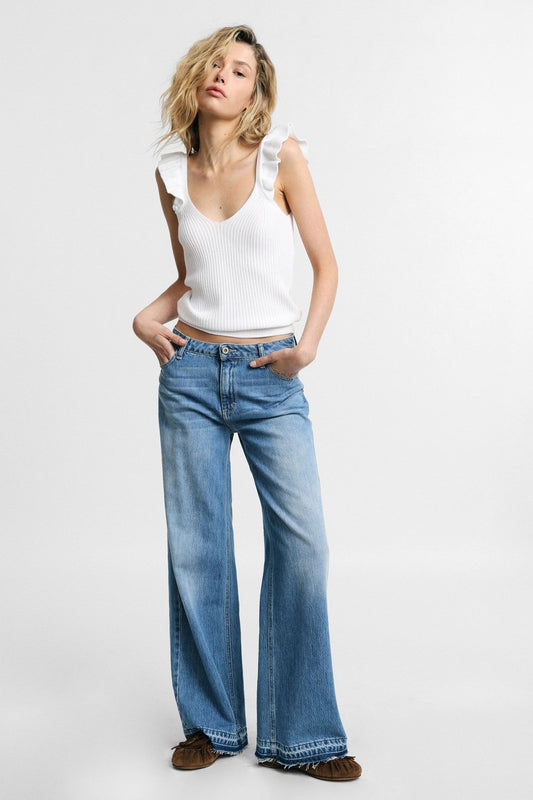 PLEASE - Jeans flare con vita bassa e fondo sfrangiato