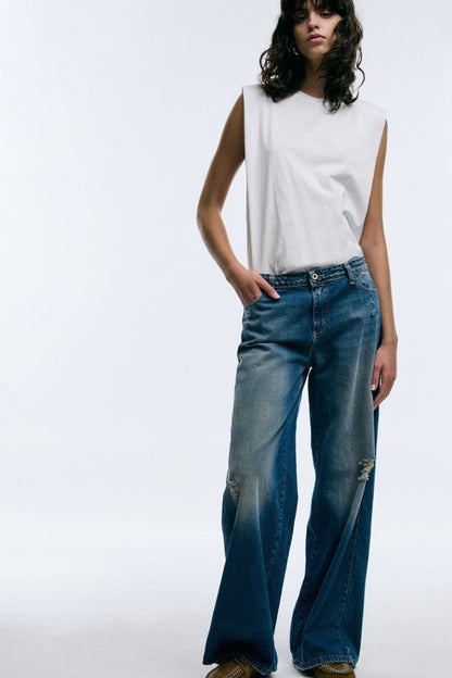 PLEASE - Jeans flare a vita bassa dettagli effetto used