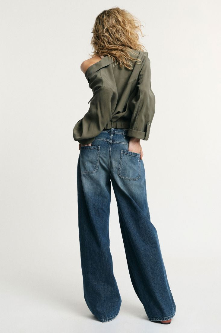 PLEASE - Jeans flare a vita bassa dettagli effetto used