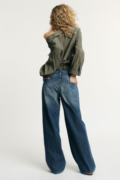 PLEASE - Jeans flare a vita bassa dettagli effetto used